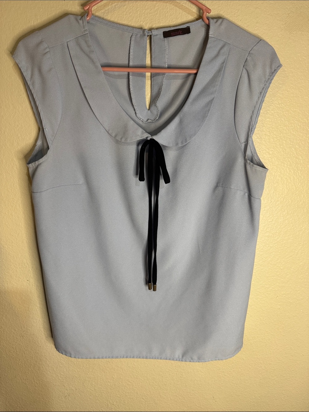 mark. Pale Blue Sleeveless Top with Black Neck Tie